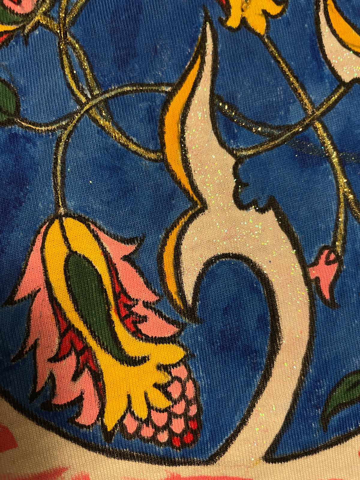 Close-up of hand-painted floral details and fabric texture within the blue paisley motif on Blue Paisley Drift by HANDLURIA.